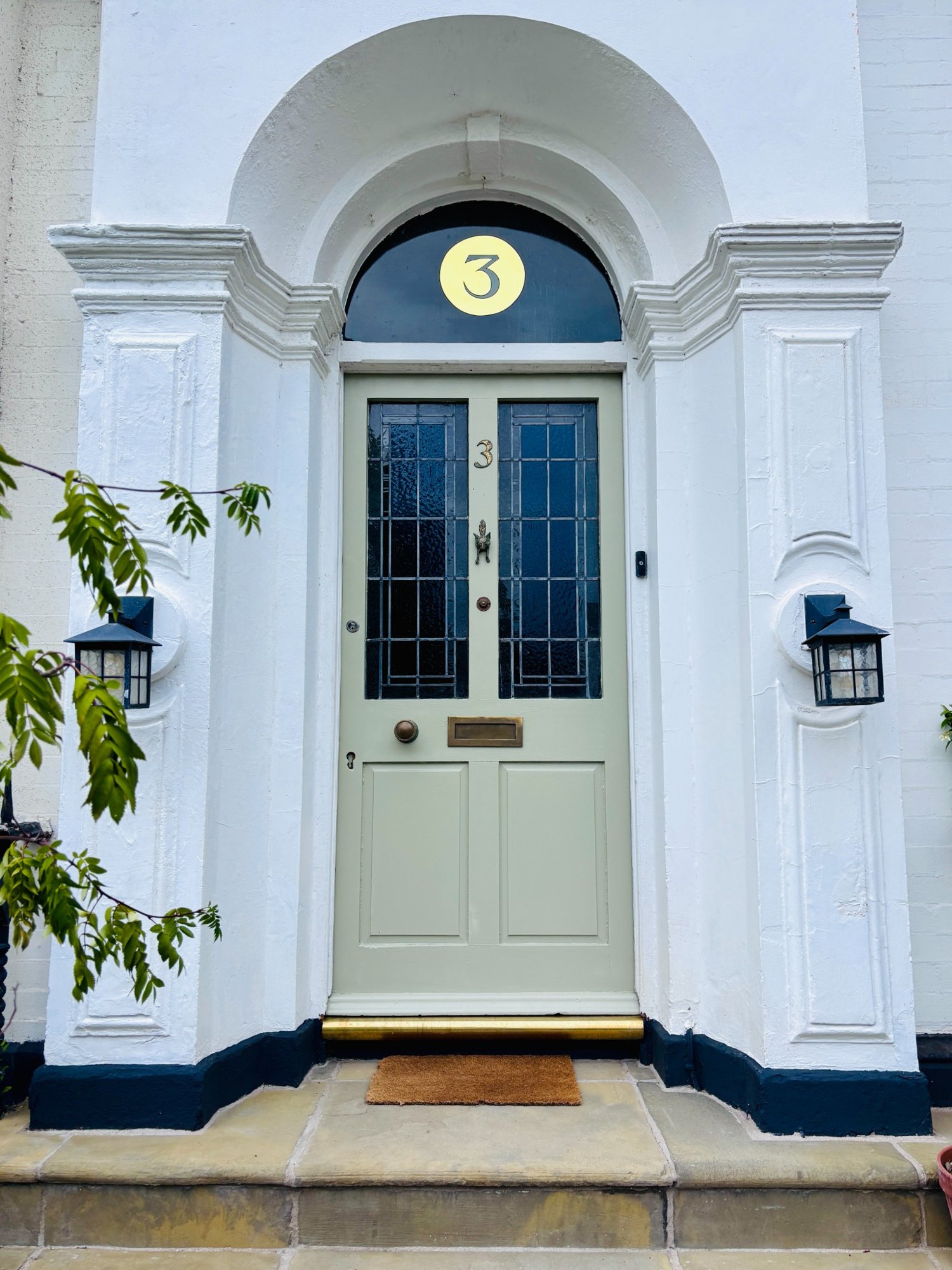 Original arched entrance and glazed front door